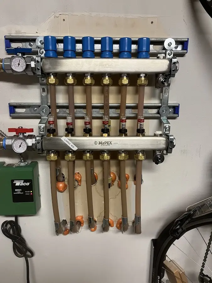 Plumber performing Gas Leak Detection at a residential property in Roxbury